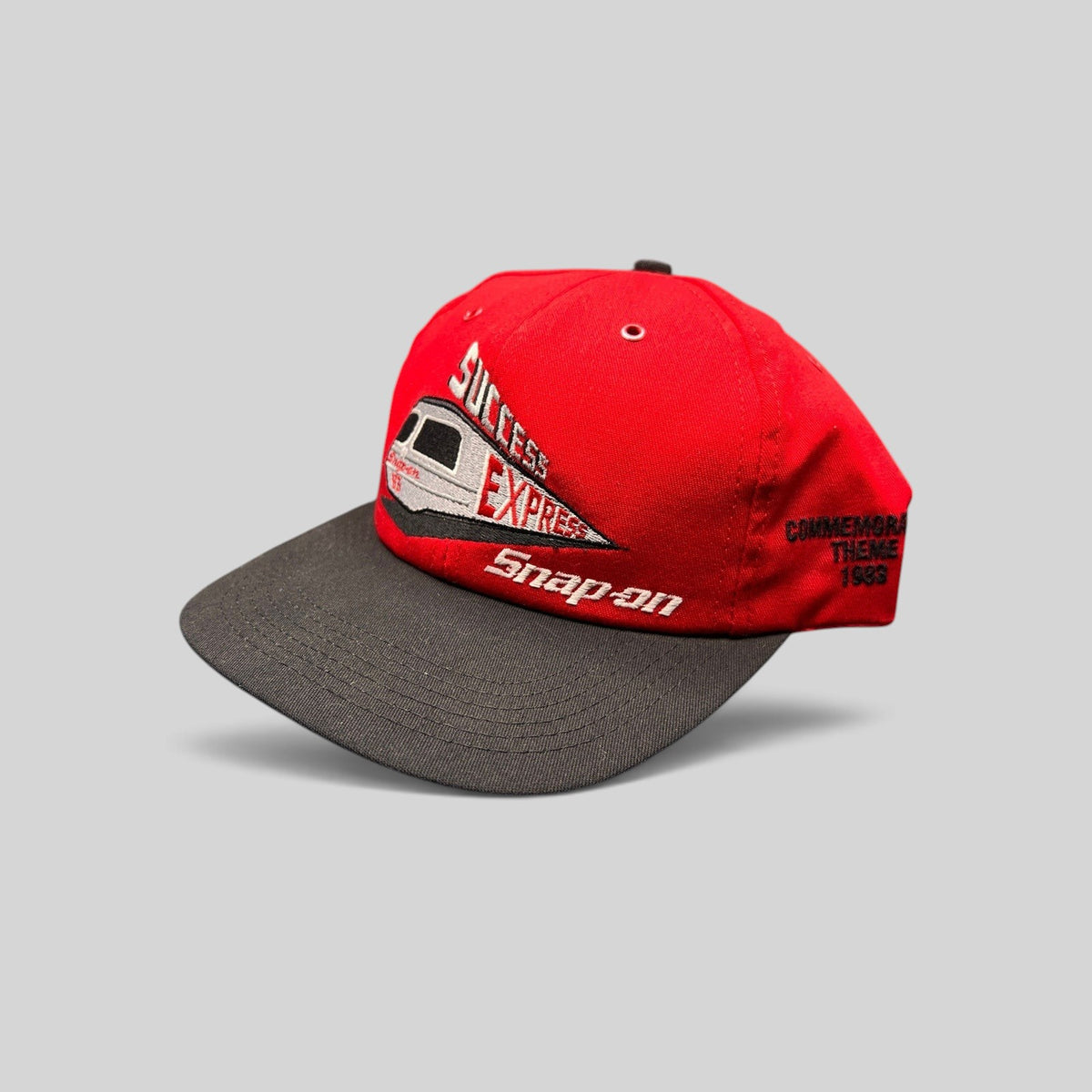 Raree Finds vintage 1993 Snap-on Success Express snapback hat with red crown, black brim, and embroidered train graphic.