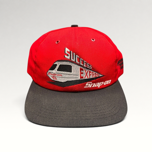 Raree Finds vintage 1993 Snap-on Success Express snapback hat with red crown, black brim, and embroidered train graphic.