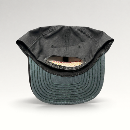 Raree Finds vintage 90s Americana Fireworks snapback hat showing the black crown, adjustable strap, and green undervisor