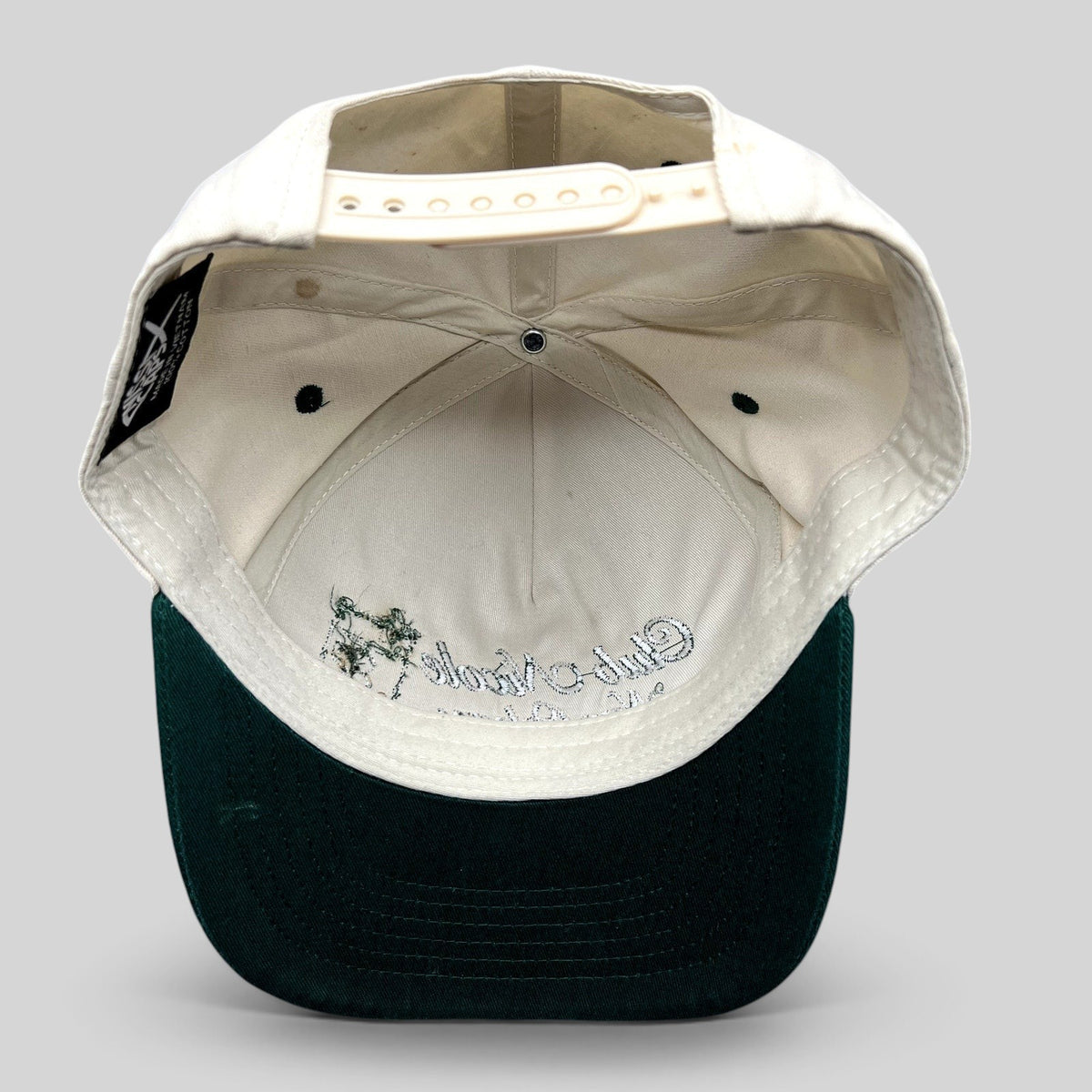 Raree Finds vintage Club Nicole New Orleans snapback cap interior showing cream cotton crown and green brim