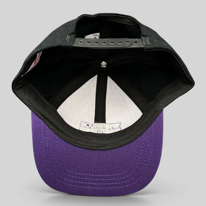 Raree Finds vintage Competition Headwear snapback hat interior showing black crown, purple brim, and plastic closure.