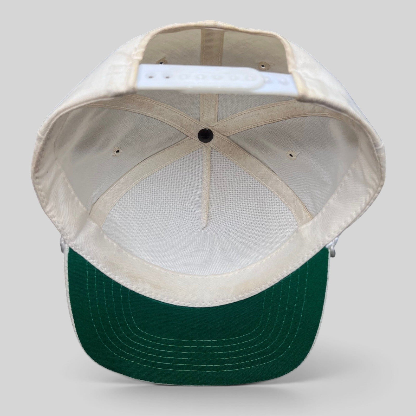 Raree Finds vintage Ya-Hopi Headwear Super Bowl XXII snapback hat showing the interior white crown and green underbill