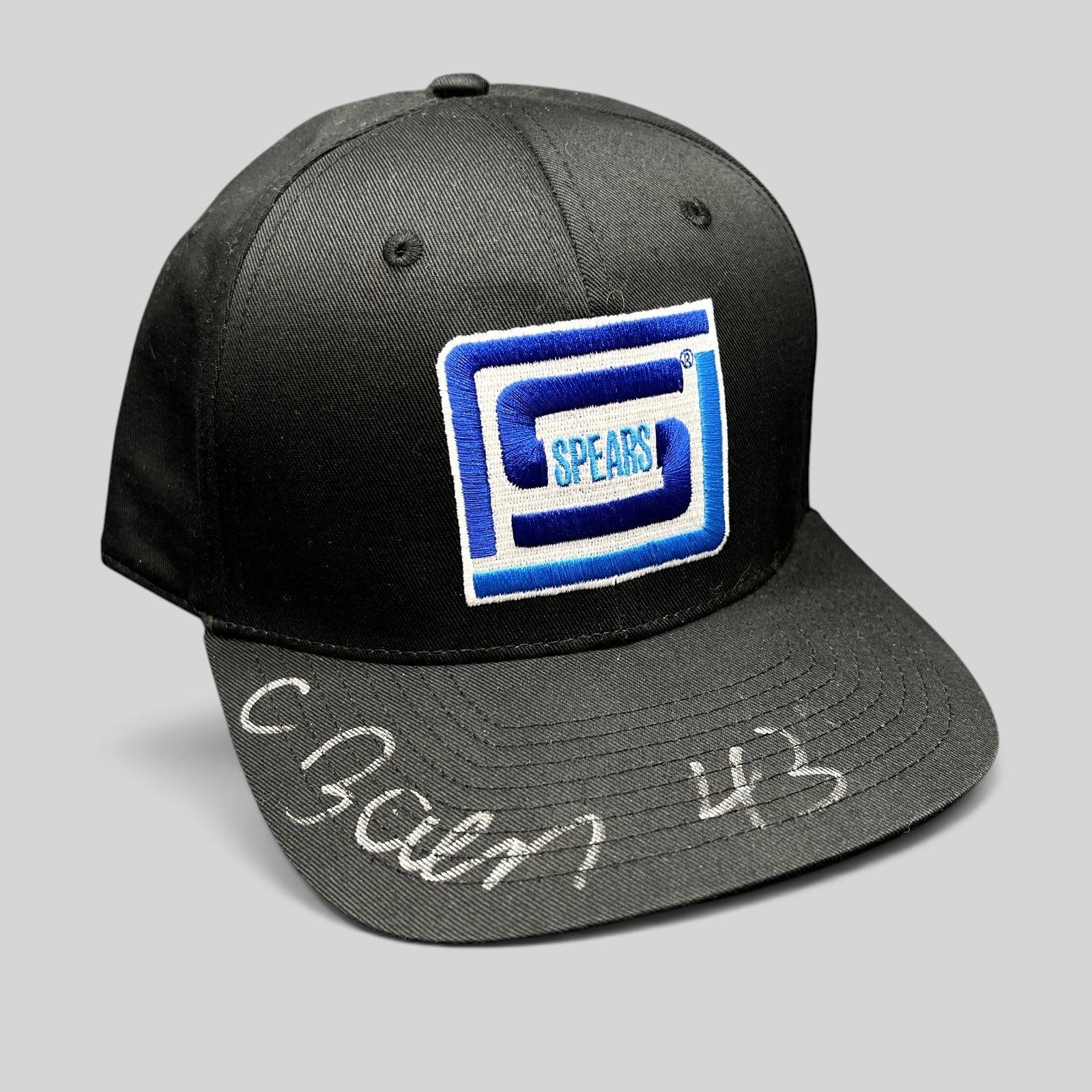 Raree Finds vintage black snapback hat with blue Spears logo embroidery and a silver autograph on the brim