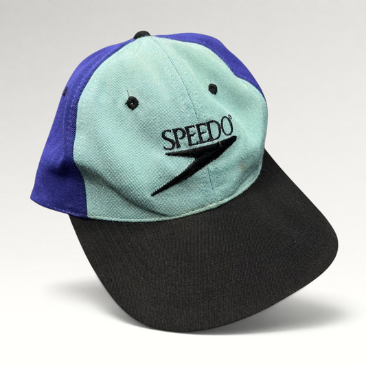 Raree Finds vintage Speedo 90s colorblock snapback hat with teal, royal blue, and black panels and embroidered logo.