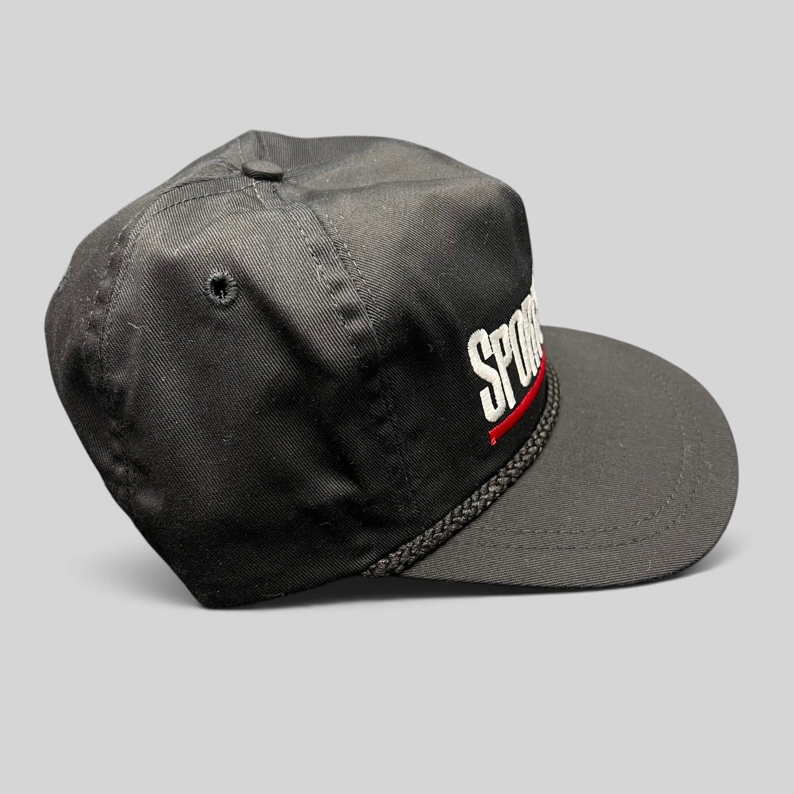 Raree Finds vintage black SportSouth strapback hat with white and red embroidery and braided rope brim detail.