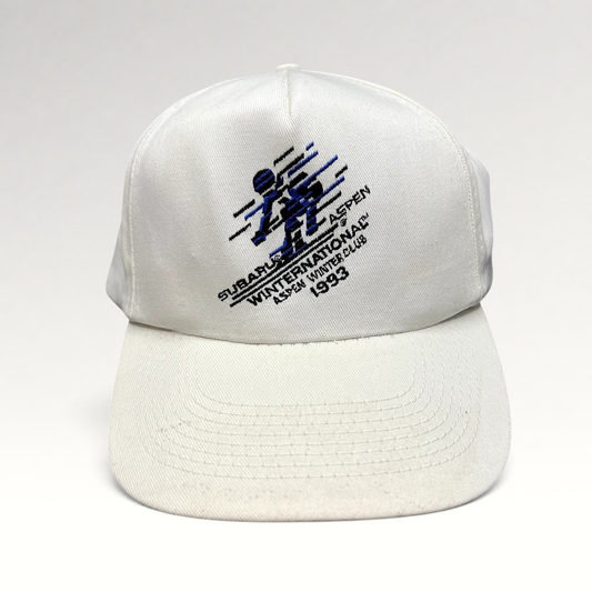 Raree Finds vintage 1993 Subaru Aspen Winternational white snapback hat with embroidered skier graphic and green brim