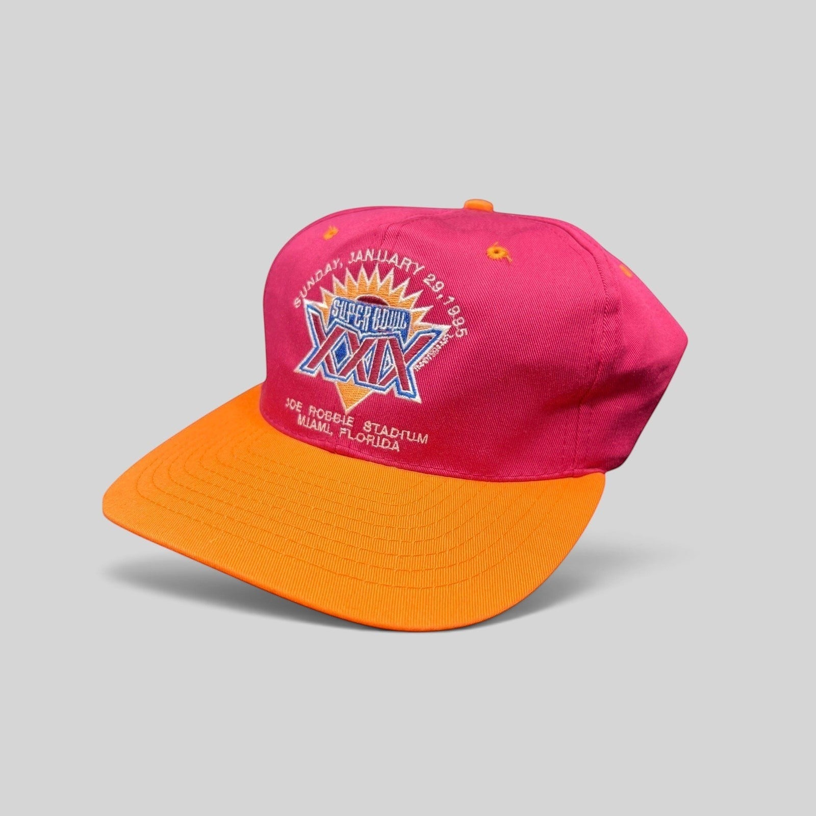 Raree Finds vintage 1995 Super Bowl XXIX snapback hat with a maroon crown, orange brim, and embroidered NFL logo.