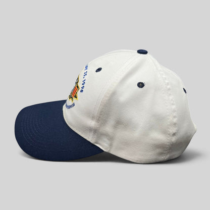 Raree Finds vintage 1998 Super Bowl XXXII snapback hat with white crown, navy brim, and embroidered NFL graphics.