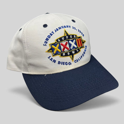Raree Finds vintage 1998 Super Bowl XXXII snapback hat with white crown, navy brim, and embroidered NFL logo graphic.