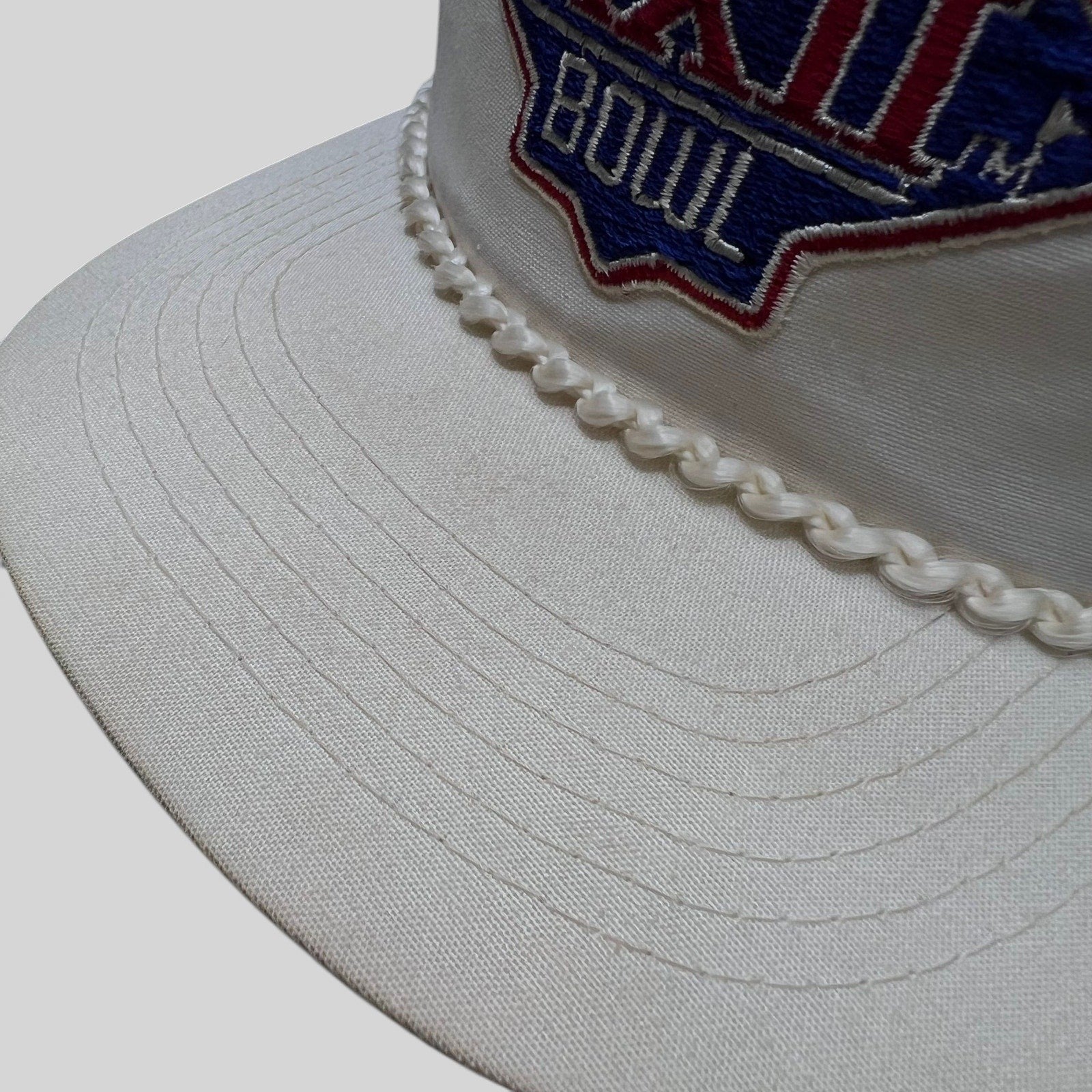 Raree Finds vintage 1988 Super Bowl XXII white snapback hat with braided rope brim detail and embroidered logo