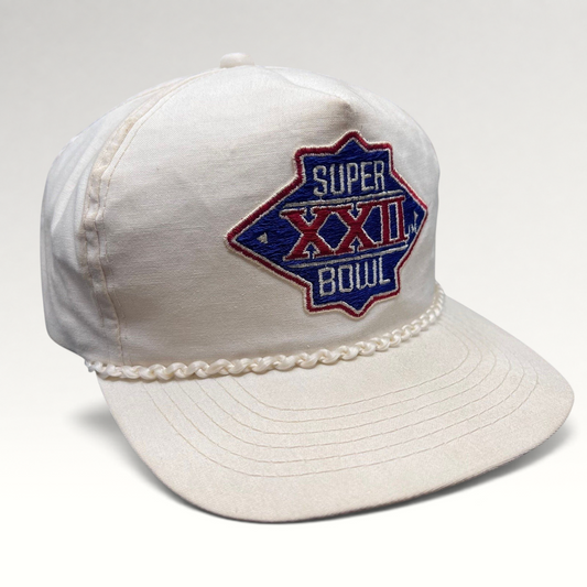 Raree Finds vintage 1988 Super Bowl XXII white snapback hat with braided rope trim and embroidered logo.