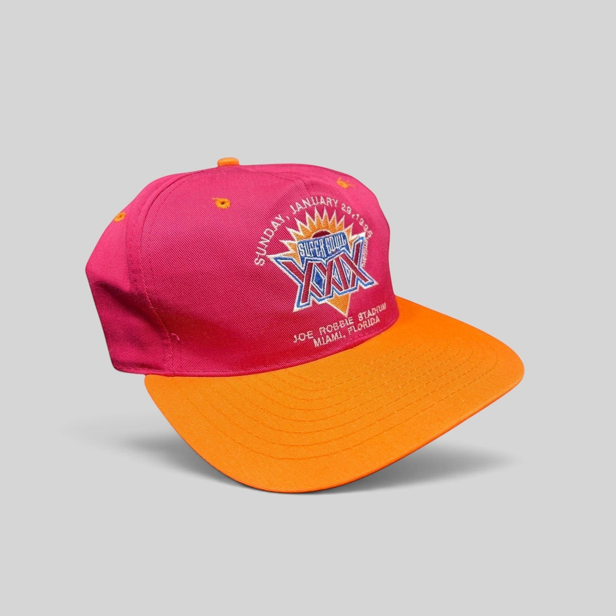Raree Finds vintage 1995 Super Bowl XXIX snapback hat with a maroon crown, orange brim, and embroidered NFL logo.