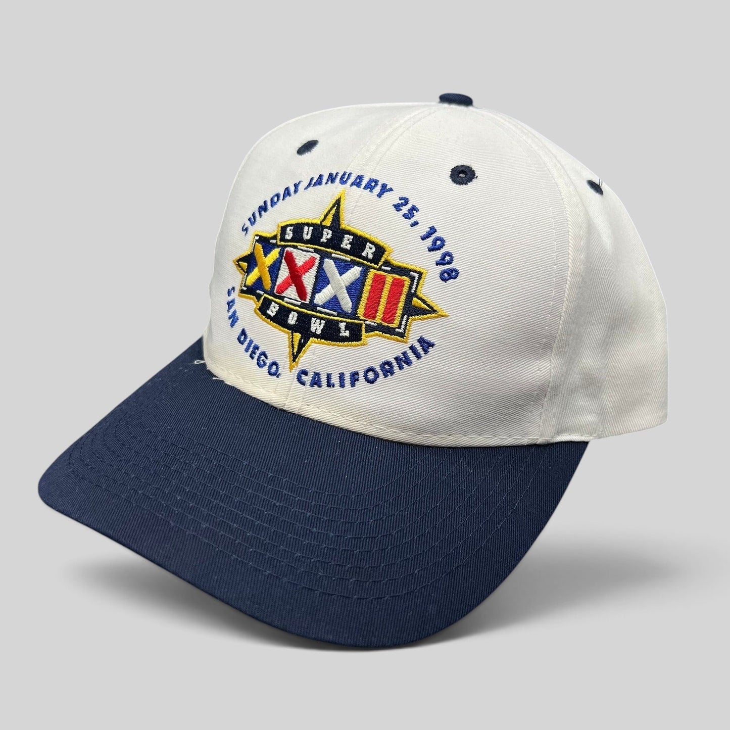 Raree Finds vintage 1998 Super Bowl XXXII snapback hat with white crown, navy brim, and embroidered San Diego logo.