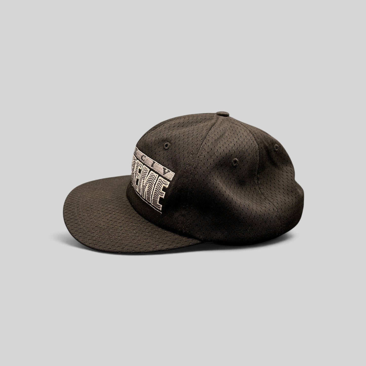 Raree Finds vintage black Supreme mesh snapback hat with 3D MCMXCIV embroidery and adjustable back closure