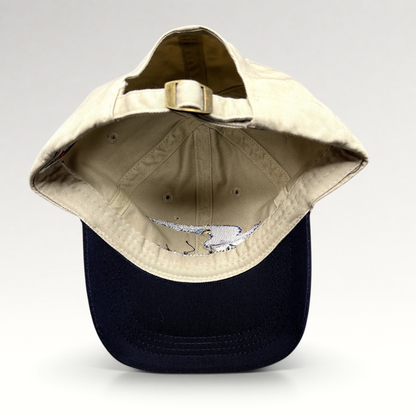 Raree Finds vintage Swift Engineering Inc two-tone khaki and navy cotton strapback hat with brass buckle closure