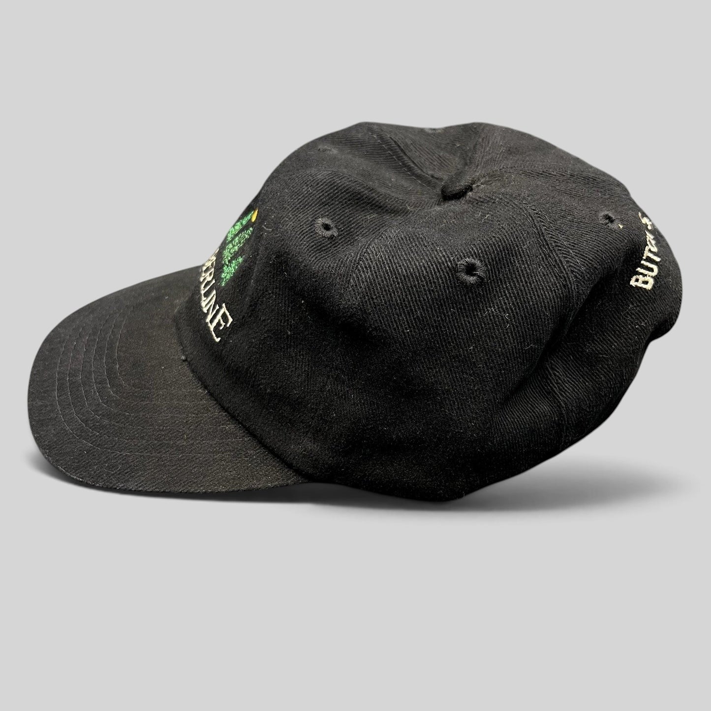 Raree Finds vintage 1990s black Timberline strapback hat with Butch’s Lobster Bar embroidery and unstructured fit.