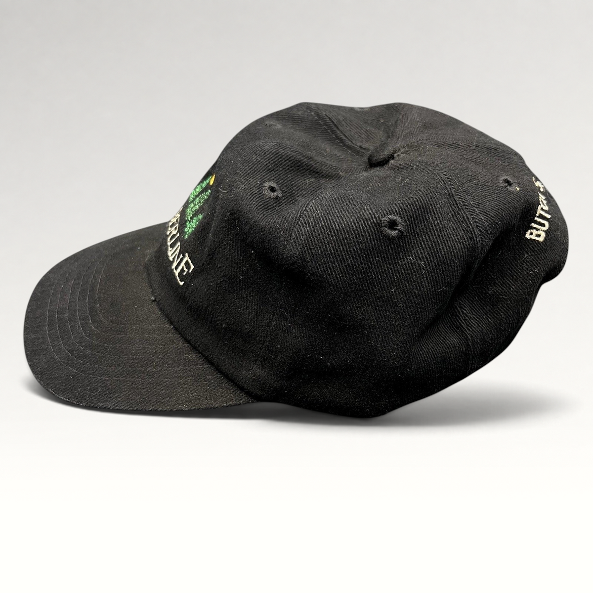 Raree Finds vintage 1990s black Timberline strapback hat with Butch’s Lobster Bar embroidery and adjustable closure.