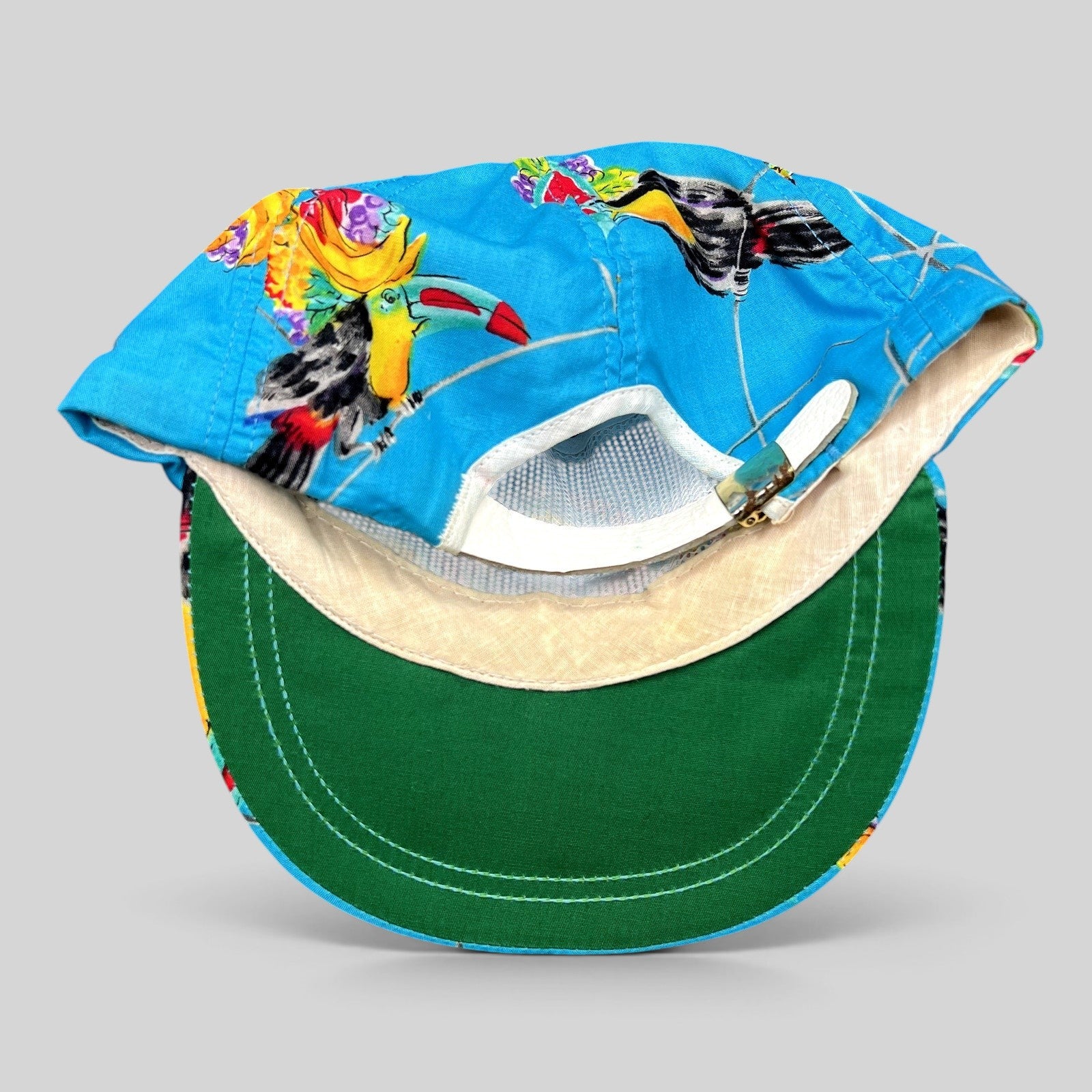 Raree Finds vintage 1992 High Country Shootout golf hat with turquoise tropical toucan print and green underbill
