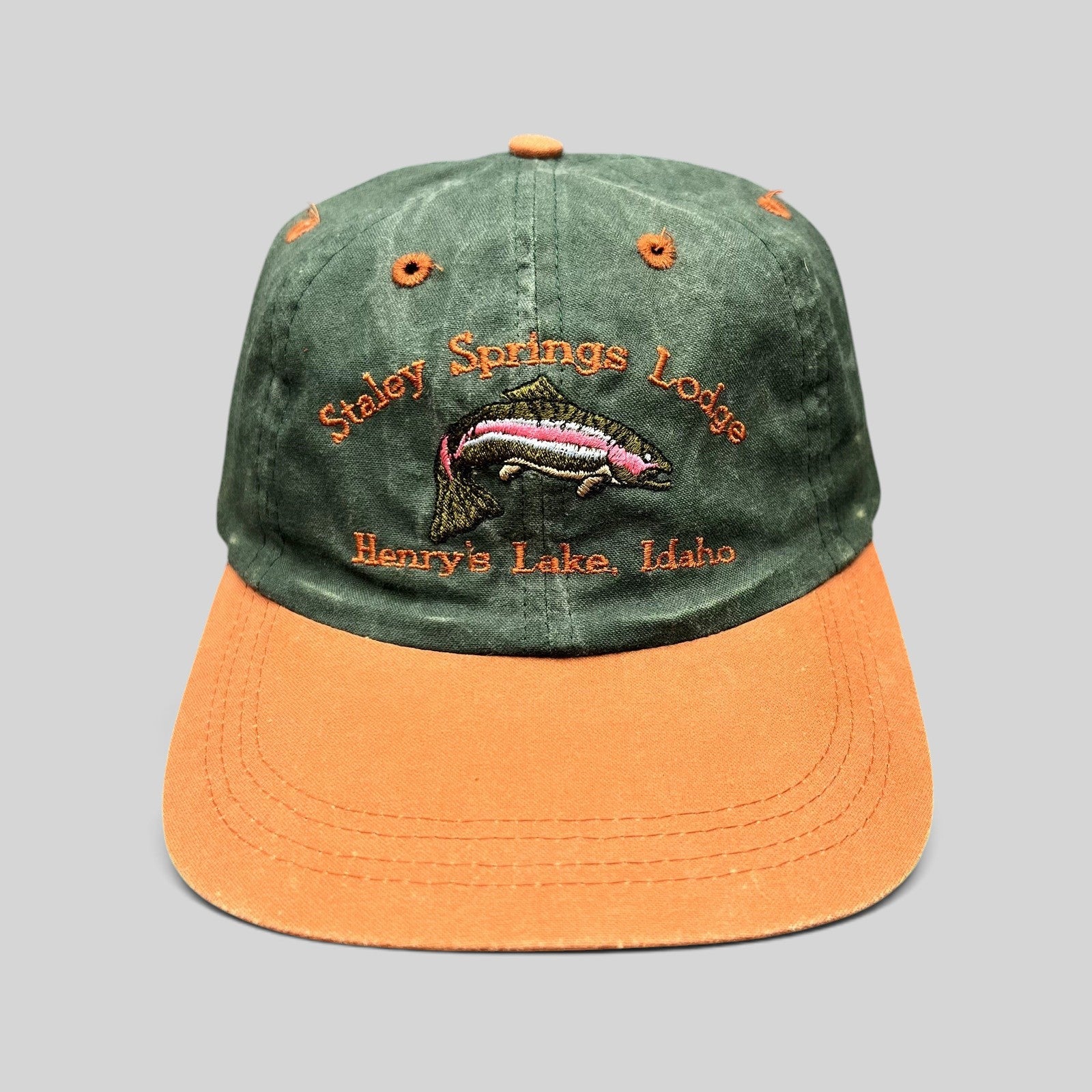 Raree Finds vintage two-tone green and orange fishing hat with embroidered trout and Staley Springs Lodge text.