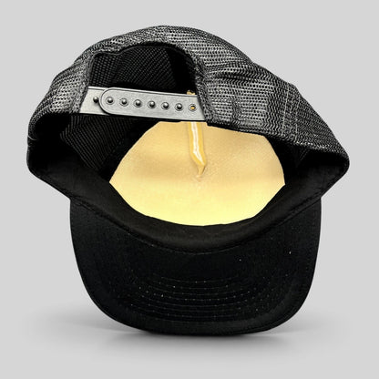 Raree Finds vintage Cassara Brothers trucker hat showing the black mesh back, adjustable snapback, and foam interior.