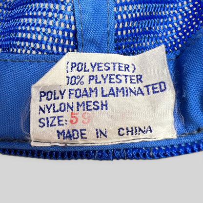 Raree Finds vintage trucker hat interior care label showing polyester and nylon mesh material composition