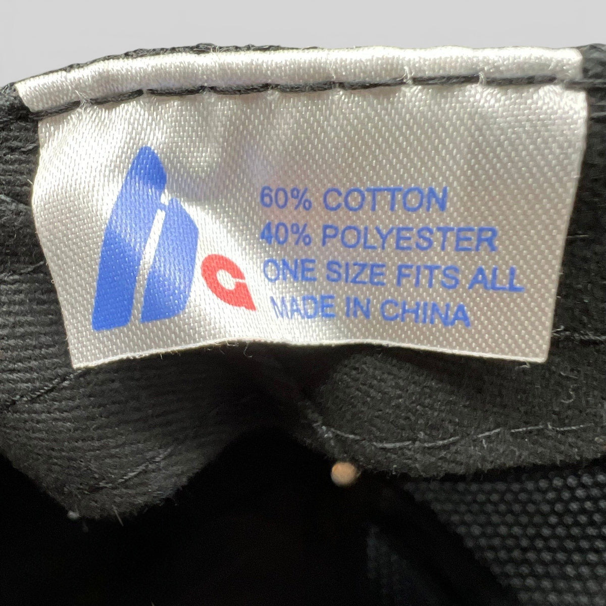 Raree Finds vintage Incline Ski Shop trucker hat interior care label showing fabric composition and origin