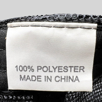 Raree Finds vintage trucker hat interior care label showing 100% polyester material and made in China origin
