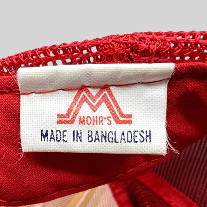 Raree Finds vintage trucker hat interior tag with Mohrs logo and Made in Bangladesh label on red mesh fabric