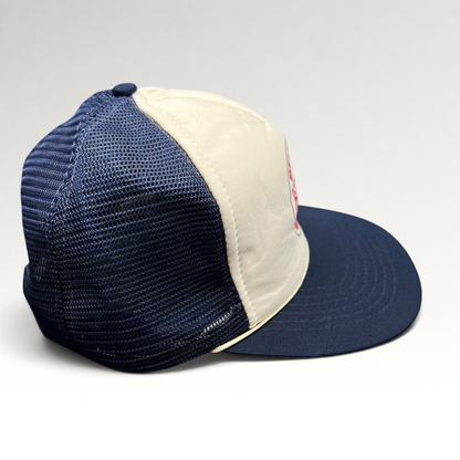 Raree Finds vintage Beverly Hills Gun Club trucker hat with white foam front, navy mesh back, and navy brim.