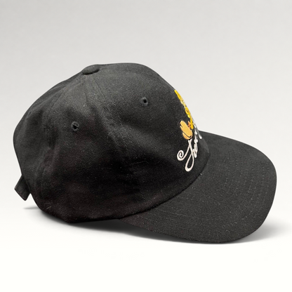Raree Finds vintage 1998 black cotton strapback hat featuring embroidered Tweety Bird and scripted logo