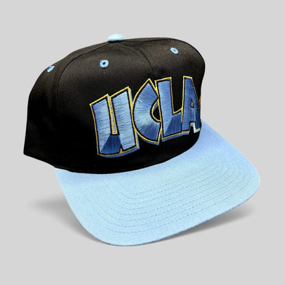 Raree Finds vintage UCLA Bruins snapback hat in black and powder blue with oversized embroidered front logo