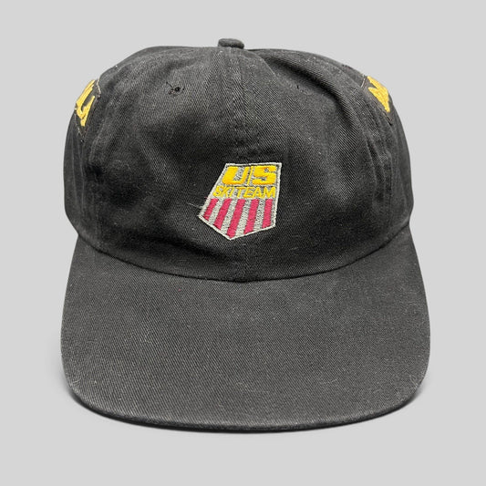 Raree Finds vintage 90s USA Ski Team black snapback hat with red, white, and gold embroidered shield logo