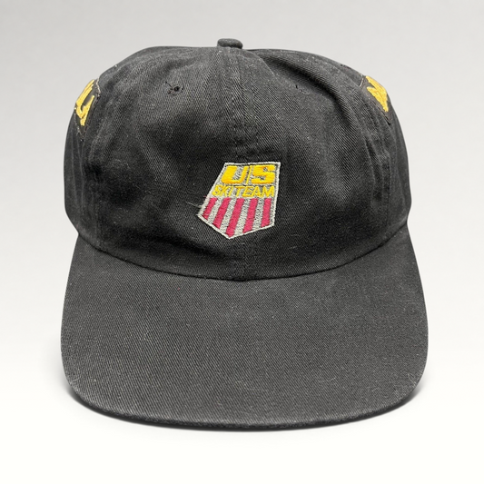 Raree Finds vintage 90s USA Ski Team black snapback hat with red, white, and gold embroidered shield logo