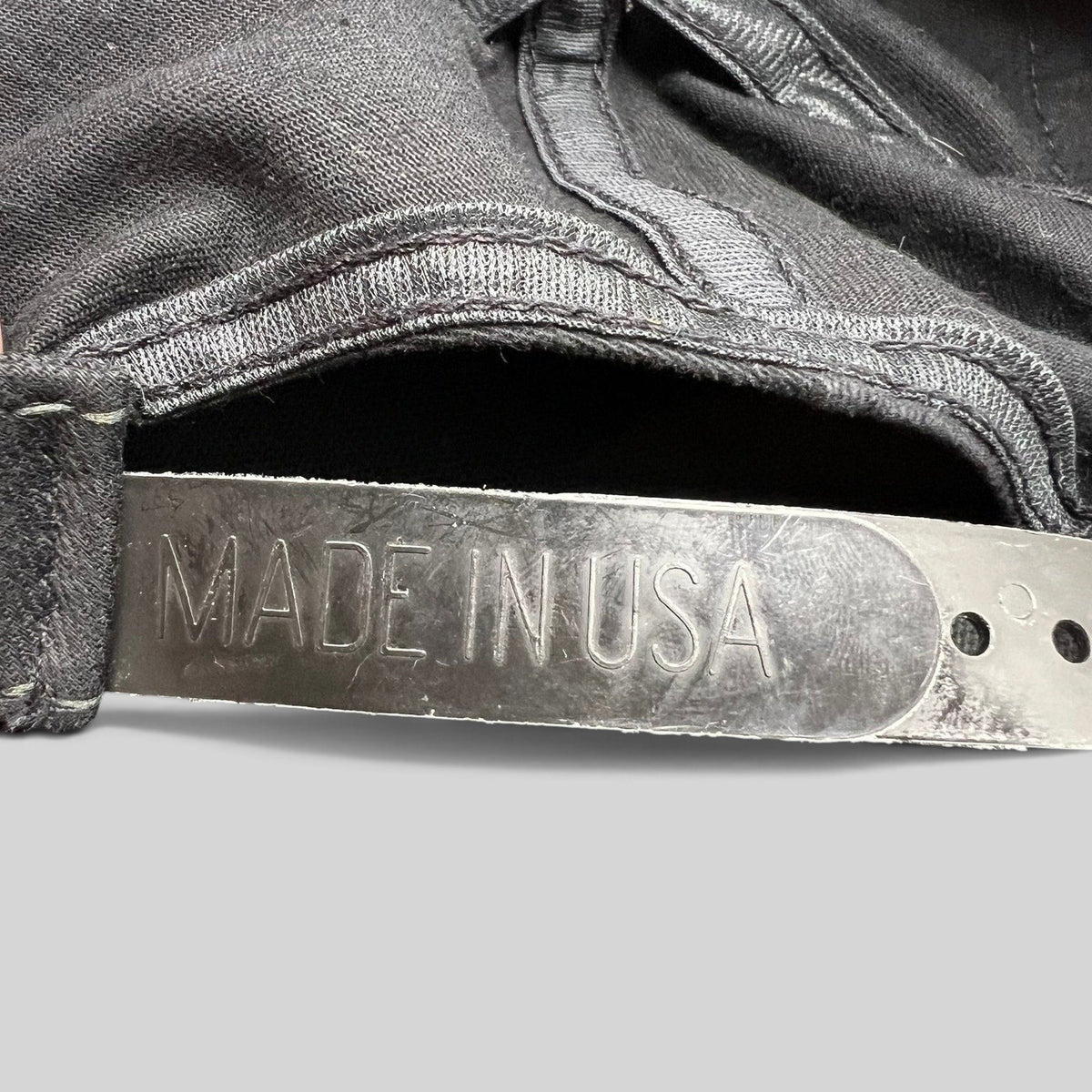 Raree Finds vintage black snapback hat with Made in USA embossed on the plastic adjustable strap closure