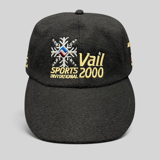 Raree Finds vintage black wool strapback hat from the 2000 Vail Sports Invitational with embroidered snowflake logo