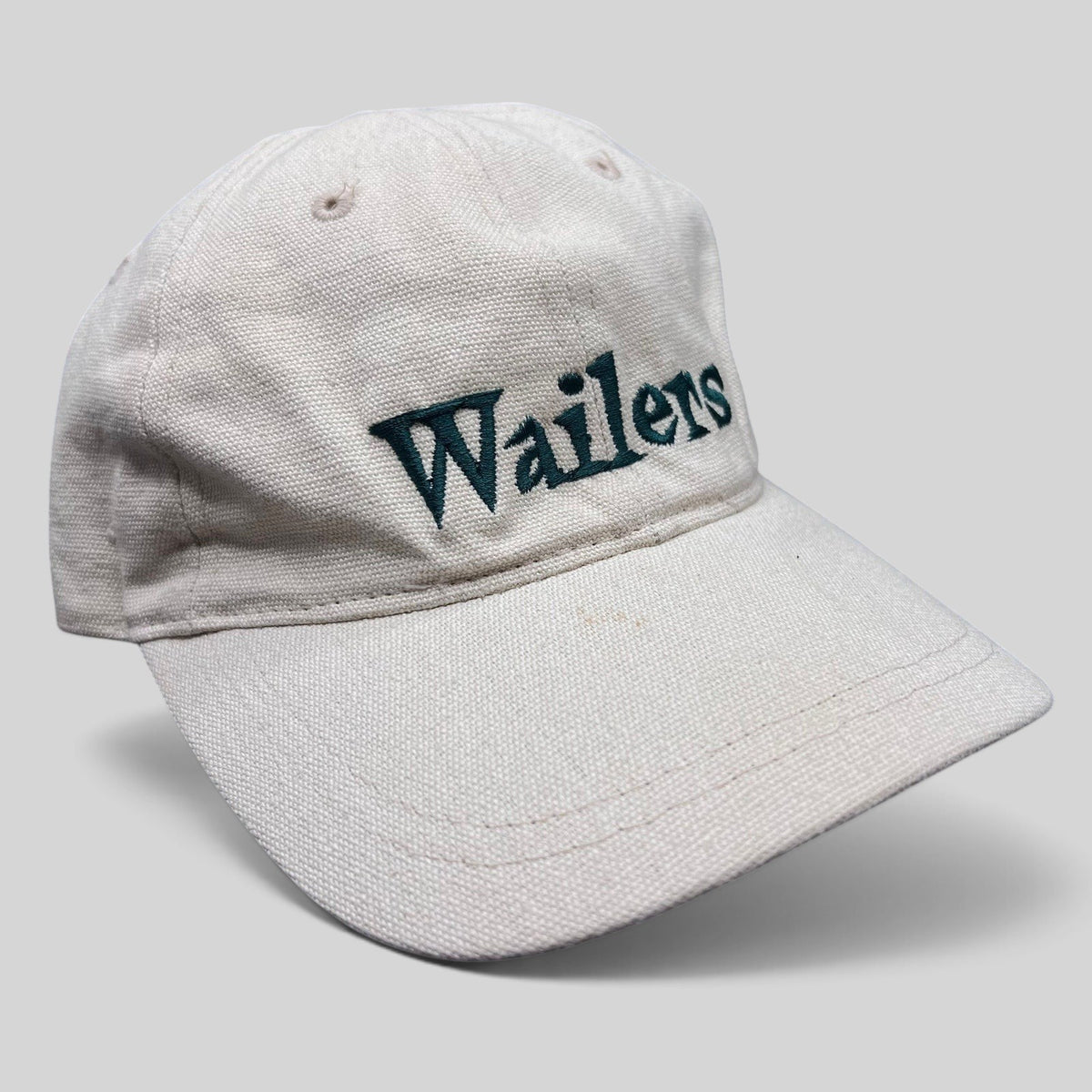 Raree Finds vintage 90s Wailers reggae strapback hat in off-white cotton canvas with dark green embroidered logo