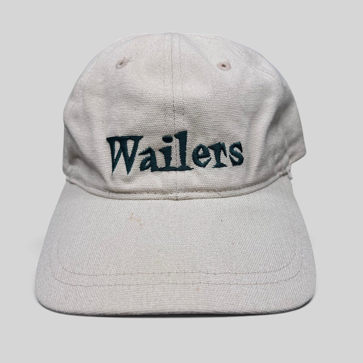 Raree Finds vintage 90s Wailers reggae band strapback hat in off-white cotton canvas with dark green embroidery.