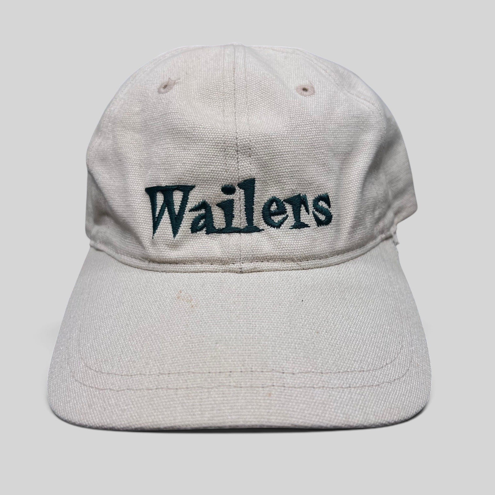 Raree Finds vintage 90s Wailers reggae band strapback hat in off-white cotton canvas with dark green embroidery.