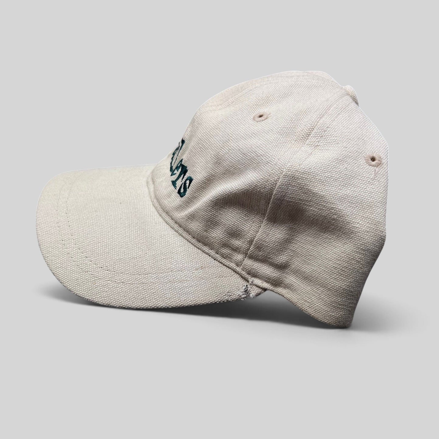 Raree Finds vintage 90s Wailers reggae strapback hat in off-white cotton canvas with dark green embroidered logo