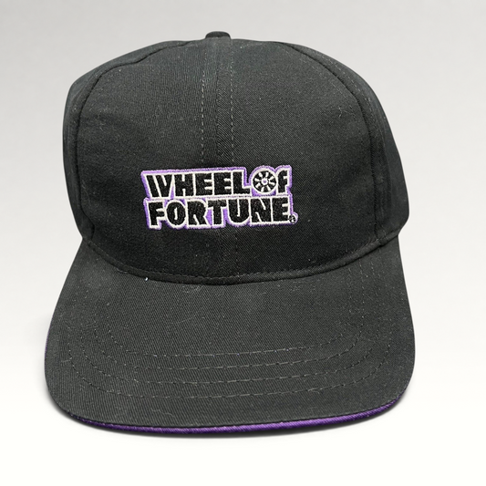 Raree Finds vintage black snapback hat with purple brim and embroidered Wheel of Fortune logo by Competition Headwear