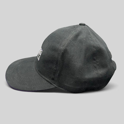 Raree Finds vintage Wheel of Fortune snapback hat in black with a purple brim accent and embroidered show logo.