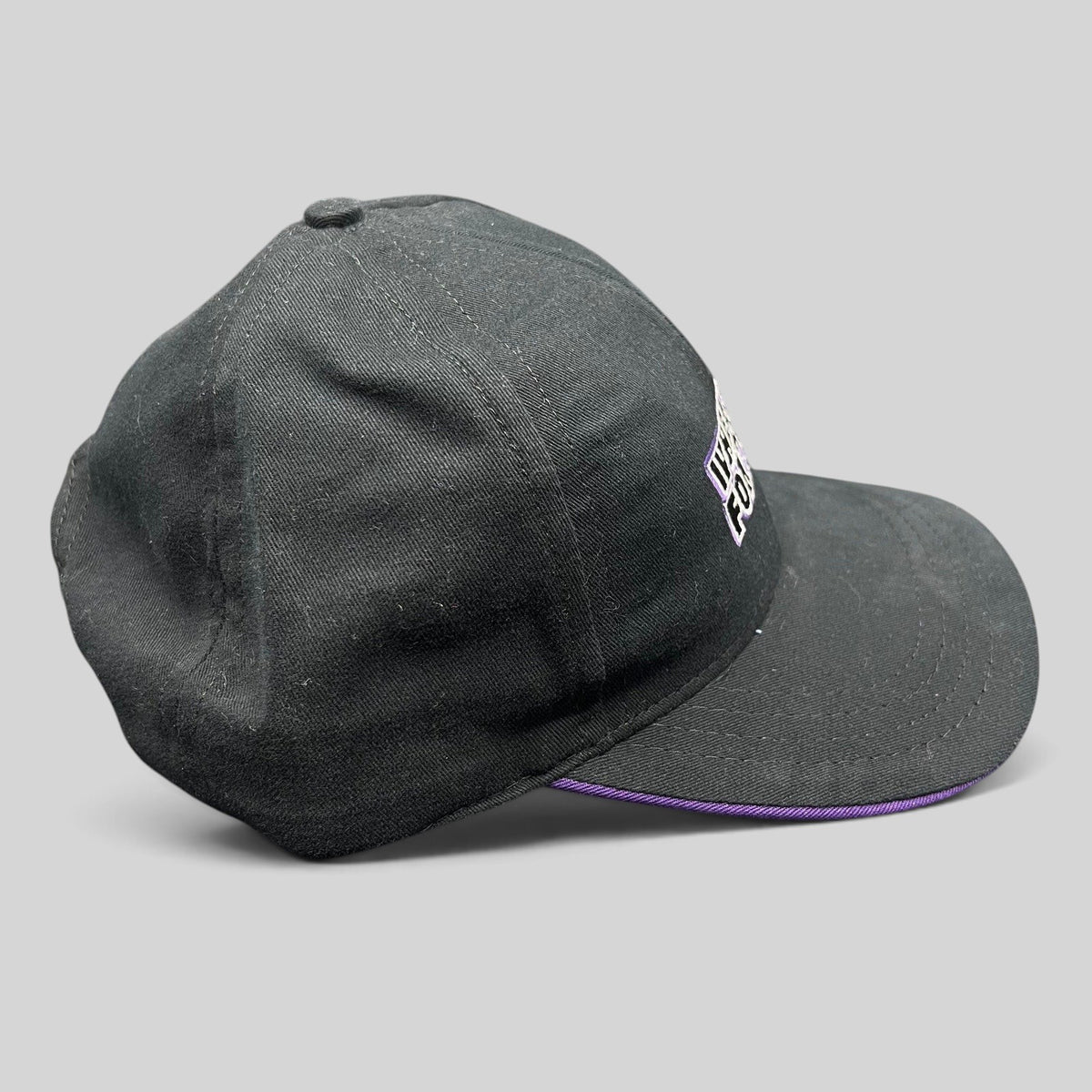 Raree Finds vintage Wheel of Fortune black snapback hat with purple brim accent and embroidered logo