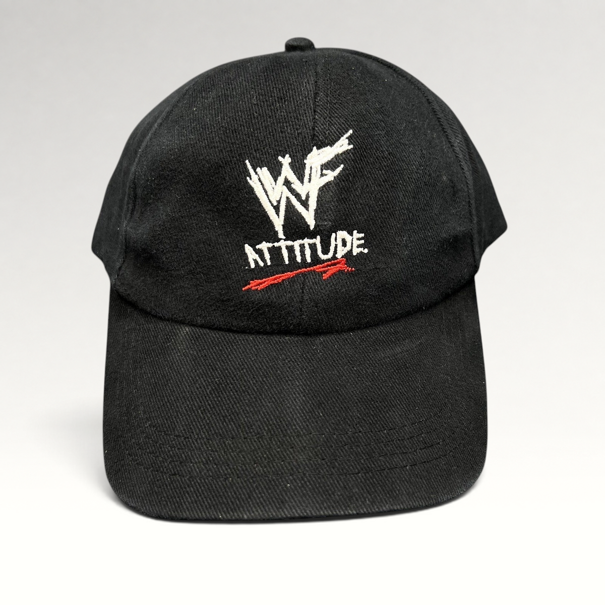 Raree Finds vintage black WWF Attitude Era snapback hat with white scratch logo and red embroidery detail