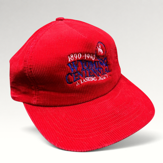 Raree Finds vintage red corduroy Wyoming Centennial snapback hat with embroidered 1890-1990 cowboy logo and text.