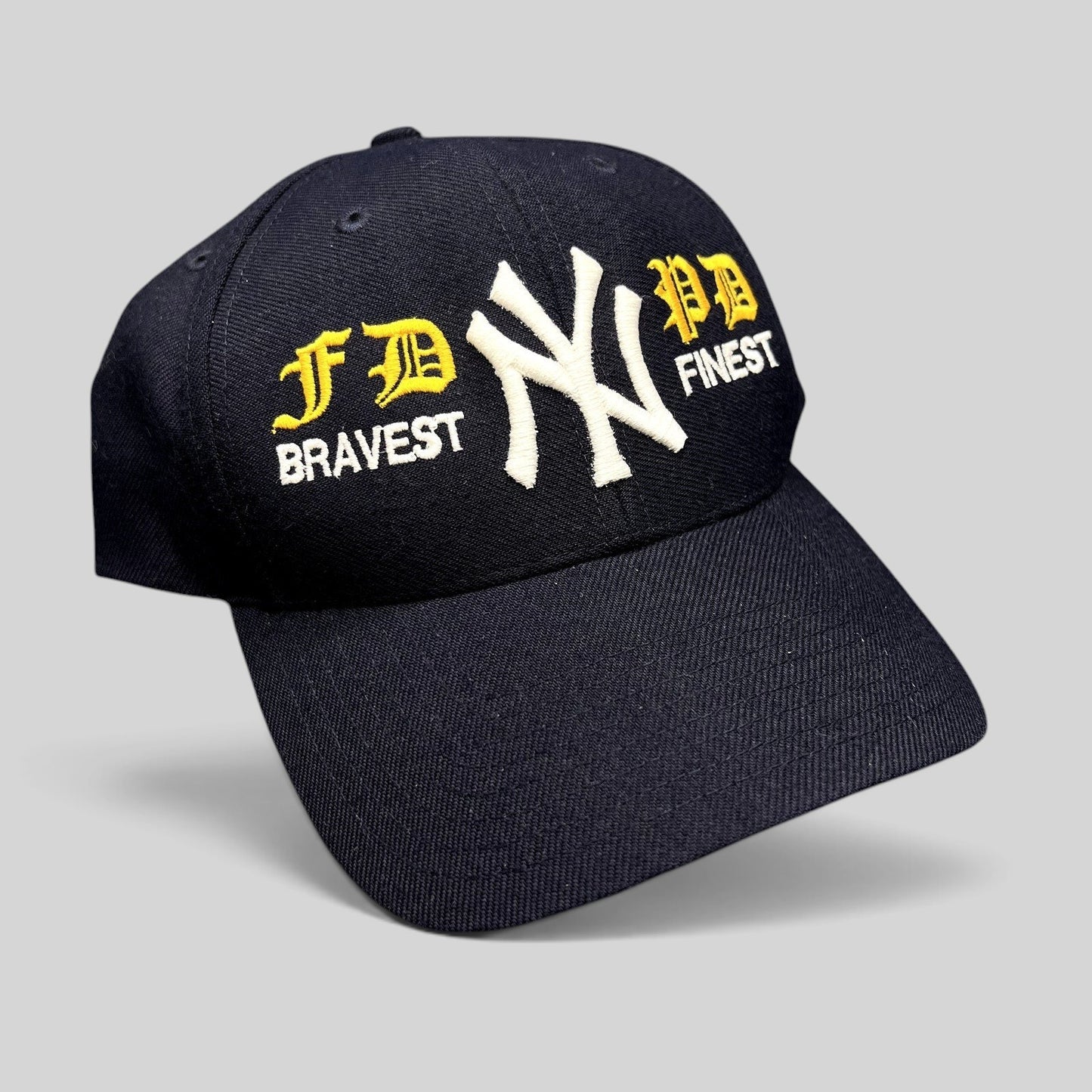 Raree Finds vintage navy New York Yankees snapback hat with embroidered FDNY and NYPD tribute lettering