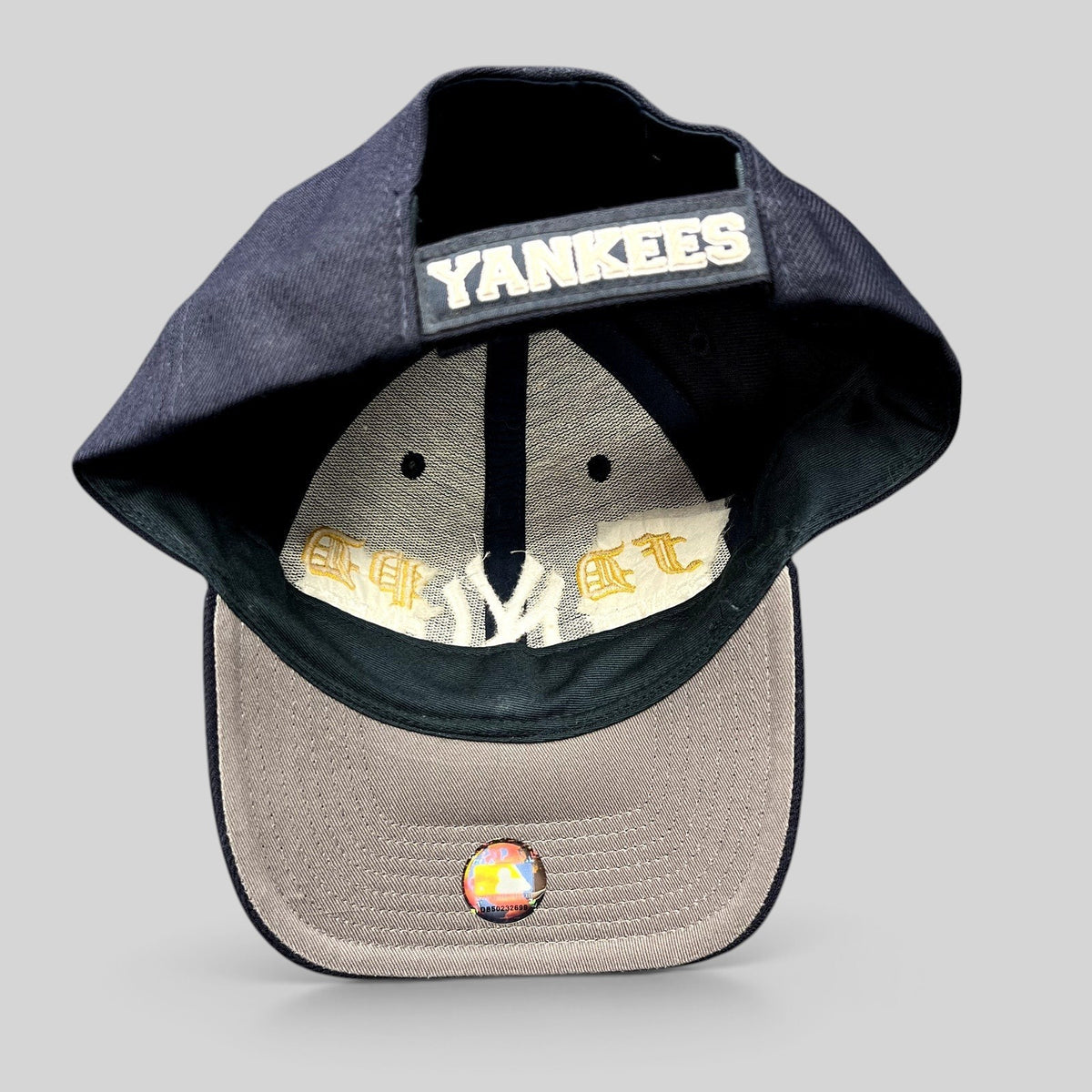 Raree Finds vintage navy New York Yankees snapback hat with FDNY and NYPD tribute embroidery on the interior brim
