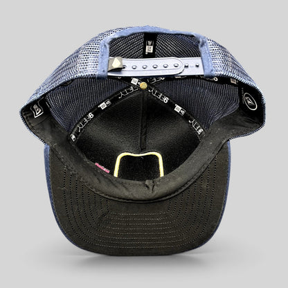 Raree Finds Volcom x New Era 9FIFTY trucker hat interior showing mesh backing, snapback closure, and branded taping.