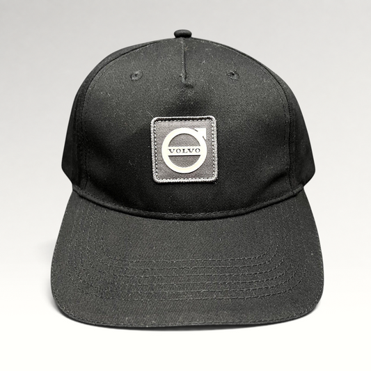 Raree Finds black organic cotton adjustable hat featuring a raised rubberized Volvo Iron Mark logo patch on the front