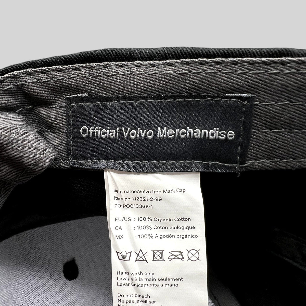 Raree Finds black Volvo Iron Mark cap interior label showing 100% organic cotton material and official branding