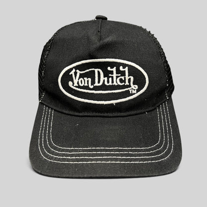 Raree Finds vintage Von Dutch black and white trucker hat with embroidered oval logo and contrast stitching.